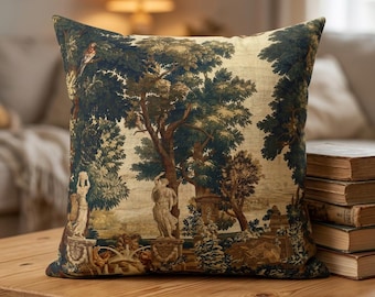May include: A square throw pillow featuring a detailed tapestry-style print of a landscape with lush green trees, classical stone statues, and a bird perched on a branch. The scene is rendered in shades of dark green, cream, and brown tones.