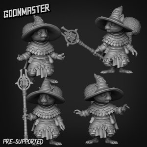 Puede incluir: Una miniatura impresa en 3D de una ardilla con un sombrero de mago y una túnica, sosteniendo un bastón. La miniatura está pre-soportada y viene en múltiples poses. El texto "GOONMASTER" y "PRE-SUPPORTED" es visible en la imagen.