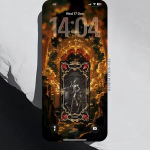 May include: Smartphone screen displaying a tarot card design with a figure on a horse, framed by ornate gold detailing and red floral accents. The time is 14:04. The screen also shows the text "PAIMON" and "Bluelumoon".