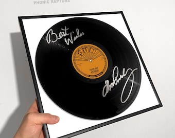 エルヴィス・プレスリーのサイン入りビニールレコード（黒枠付き