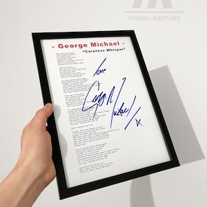 May include: Framed print featuring the lyrics to George Michael's "Careless Whisper," with the artist's signature and the word "love" in blue ink. The print is in a black frame.