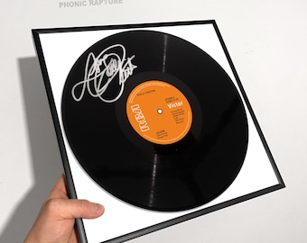 ダニエル・クレイグのボンドテーマの直筆サイン入り楽譜（COA付き