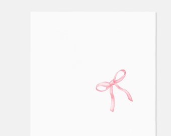 May include: A pink satin ribbon tied into a bow.