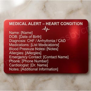 May include: A red medical alert card with the text "MEDICAL ALERT - HEART CONDITION" and a list of medical information fields, including name, date of birth, diagnosis, medications, and emergency contact details. The card has a brushed metal appearance.