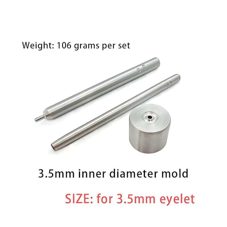 May include: A silver-colored metal eyelet setting tool set consisting of two long cylindrical rods and one cylindrical base mold. The components are marked with 3.5, indicating a 3.5mm inner diameter mold for 3.5mm eyelets. The total weight is 106 grams.