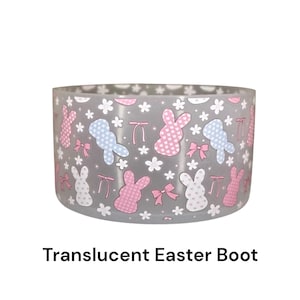 May include: A translucent Easter boot with a gray background and a pattern of pink and blue bunnies with white polka dots and white bows.