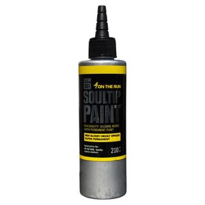 May include: A silver bottle of Soultip Paint, a high-quality alcohol-based super permanent paint. The bottle has a yellow label with black text that reads "OTR 901 ON THE RUN SOULTIP PAINT" and "HIGH QUALITY ALCOHOL BASED SUPER PERMANENT PAINT HIGH GLOSSY/HIGHLY OPAQUE SUPER PERMANENT". The label also includes the text "Optimized for the ON THE RUN Soultip opaque markers" and "210".