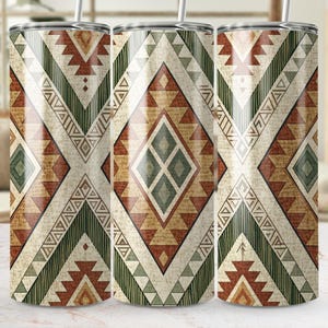 May include: Three stainless steel tumblers with a Southwestern geometric pattern in shades of brown, green, and cream. The design features diamond and triangle shapes. Each tumbler has a silver straw.