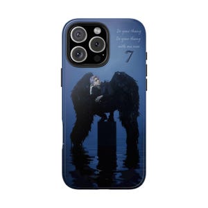 May include: A black phone case with a blue background and a picture of a person with wings. The text "Do your thang Do your thang with me now 7" is on the case.