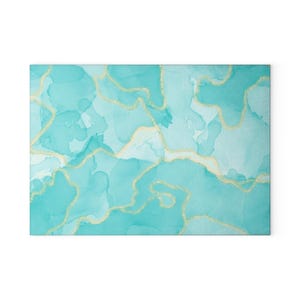 May include: Rectangular artwork with a watercolour design in shades of teal and light blue, with gold vein-like accents. The abstract design creates a modern aesthetic, suitable for home decor.