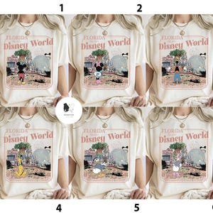 Puede incluir: Camiseta color crema con un dise&ntilde;o gr&aacute;fico de estilo vintage de Disney World en Florida. El dise&ntilde;o incluye el texto "FLORIDA Disney World" y varios personajes de Disney. El gr&aacute;fico est&aacute; enmarcado en un borde rectangular.