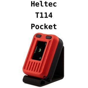 May include: A red and black Heltec T114 Pocket device with a small screen displaying the text "maker.cc.org" and a green arrow. The device has a black stand.