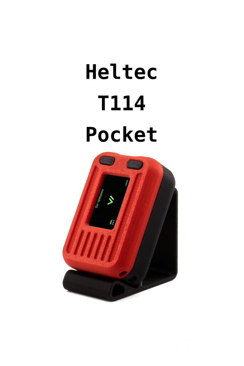 May include: A red and black Heltec T114 Pocket device with a small screen displaying the text "maker.cc.org" and a green arrow. The device has a black stand.