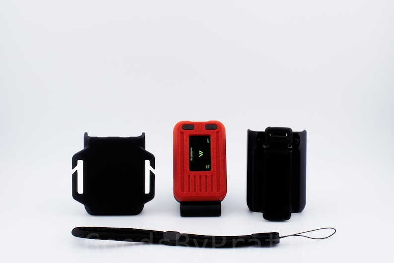 May include: A red and black personal safety device with a small screen displaying a symbol. The device comes with a black carrying case and a black lanyard.