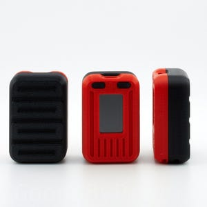 May include: Three red and black devices with a small screen and buttons. The devices are arranged in a row on a white surface.