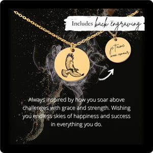 May include: A gold-colored necklace with two round pendants. One pendant features an engraved eagle design, and the other has the words "je t'aime mon amour". The text "Includes back engraving" is also visible.