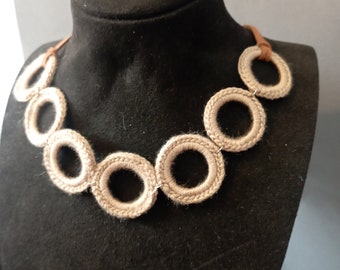 Beige hoop necklace. Handmade with crochet.