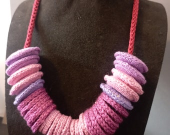 Crochet hoop necklace, in various shades of purple.
