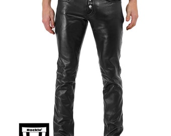 May include: Black leather pants with a button fly and pockets. The pants have a fitted design and a classic five-pocket style. The pants are made of a shiny, smooth leather material. The brand logo is visible on the lower left.