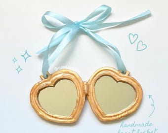 clay heart locket mirror, coquette gold blue ribbon bow wall hanging, cute girly whimsical decor handmade lovecore kawaii dreamy pastel home