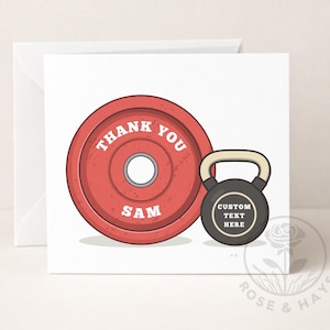 May include: A white greeting card featuring a red weight plate and a black kettlebell. The weight plate has the words "THANK YOU SAM" in white. The kettlebell has the words "CUSTOM TEXT HERE". The card is for fitness enthusiasts.