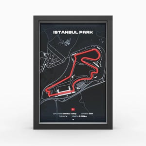 May include: A framed poster featuring a dark gray map of the Istanbul Park race track with the circuit highlighted in bright red. The text reads ISTANBUL PARK, LOCATION: Istanbul, Turkey, OPENED: 2005, TURNS: 14, and LENGTH: 5.338 km.