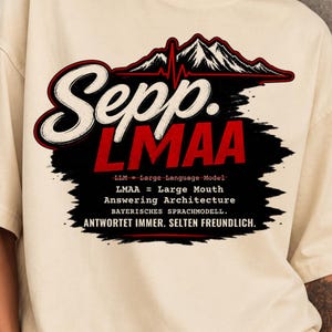 May include: A cream-colored t-shirt featuring a graphic with a mountain silhouette, a red heartbeat line, and the text Sepp. LMAA. It includes definitions for LLM and LMAA, plus the German text: BAYERISCHES SPRACHMODELL. ANTWORTET IMMER. SELTEN FREUNDLICH.
