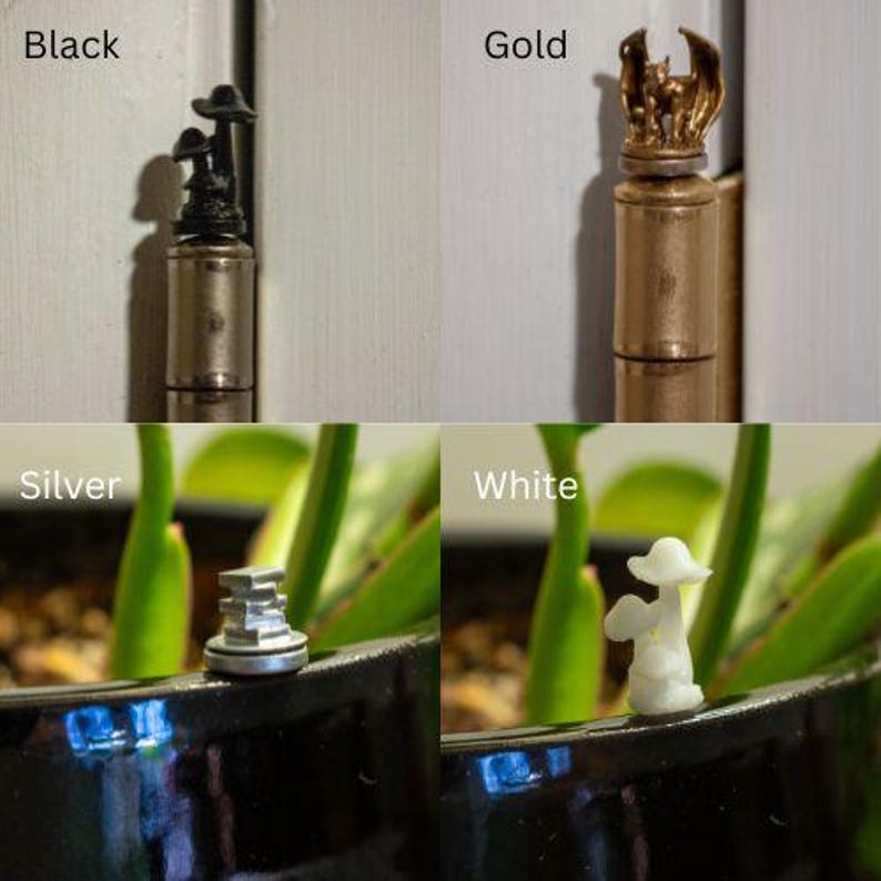 May include: Four door hinge finials in black, gold, silver, and white. Each finial features a different mushroom-shaped design.