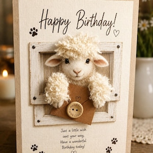 May include: A birthday greeting card featuring a 3D-style illustration of a fluffy white lamb peeking through a wooden window frame. The lamb holds a brown envelope with a wooden button closure. Text reads: Happy Birthday! Just a little wish sent your way, Have a wonderful Birthday today!