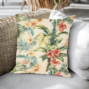 Oreiller d'extérieur floral tropical avec motifs colorés d'hibiscus et de feuilles de palmier pour véranda, piscine ou terrasse