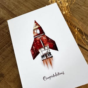 Tarjeta de felicitación &quot;Cohete - Felicitaciones&quot; (impresión)