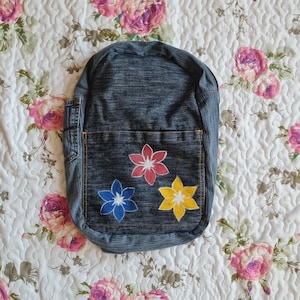 Backpack made of recycled jeans with a hand-painted flower, Jeans backpack, Denim backpack, Upcycled Jeans Backpack