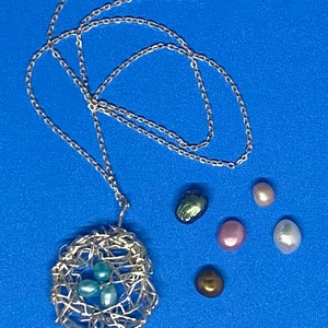 Sterling silver handcrafted nest with freshwater pearls necklace