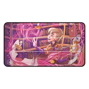 May include: A pink and purple illustrated playmat with a gridded design. The playmat features a young person with blonde hair, wearing a purple and gold robe, holding a book. The playmat has the words "Draw", "Discard", "In-Play", "Items", and "Trash" printed on it.