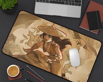 May include: A brown and beige illustrated mousepad featuring a woman with long dark hair wearing a brown and beige hat and a brown and beige outfit. The woman is holding a sword in her right hand. The background is a light brown and beige color with a dragon design.