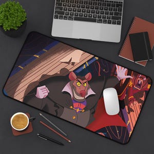 May include: A black and red mousepad with a cartoon illustration of a rat wearing a black cape and a red shirt. The rat is holding a sword and has a menacing expression. The background is a dark, shadowy scene.