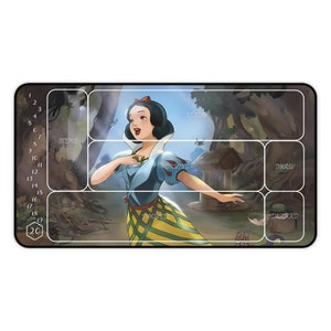 May include: A game mat featuring Snow White from the Disney movie Snow White and the Seven Dwarfs. The mat is divided into sections labeled "Ready", "Drawing", "Draw", "Discard", and "Items". There is a 20-sided die in the bottom left corner.