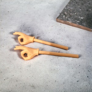 Pequeñas manos con palos - divertido OK Top