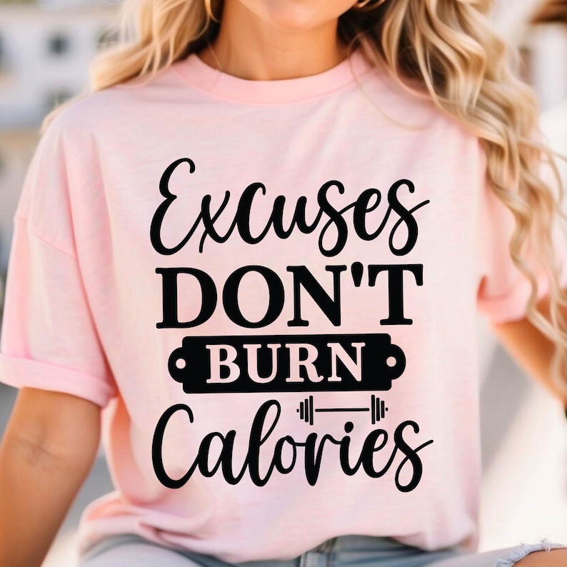 May include: Pink t-shirt with black text that reads "Excuses Don't Burn Calories" with a dumbbell graphic.