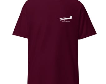 May include: Burgundy t-shirt with a white silhouette of a Vans RV-8A airplane.
