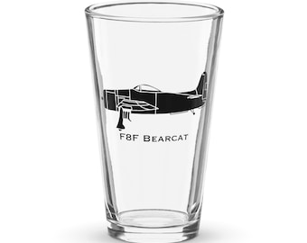 May include: A clear glass pint glass with a black silhouette of an F8F Bearcat airplane printed on the side.