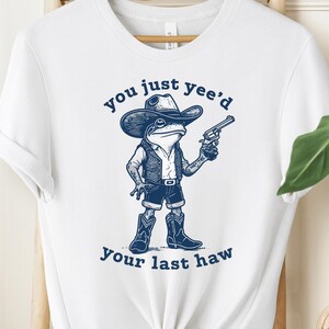 Cowboykikker T-shirt, grappig cowboykikkershirt, humoristische cowboykikker illustratie voor vrijetijdskleding, perfect cadeau voor kikkerliefhebbers en humorfans