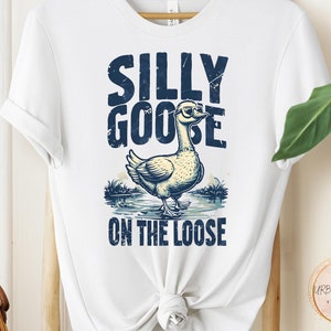 Silly Goose T-Shirt, Whimsical goose with playful sunglasses, Perfect for fun-loving folks, Great gift for animal lovers, Ideal Quirky Gift