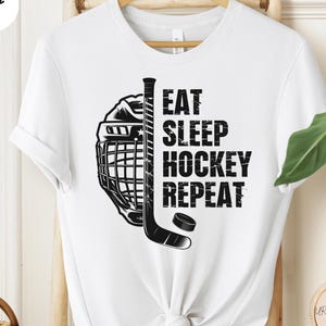 Eat Sleep Hockey Repeat T-Shirt, Fun Hockey Graphic Tee for Sports Lovers, Unique Gift for Hockey Enthusiasts, Gift for Hockey Players