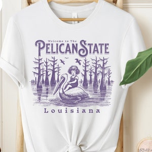 Louisiana shirt, &quot;Welcome to the Pelican State&quot; graphic tee for casual wear, perfect gift for state pride and travel lovers, unique gift