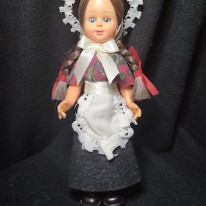Bambola souvenir vintage del Galles del Nord in plastica dura con occhi assonnati