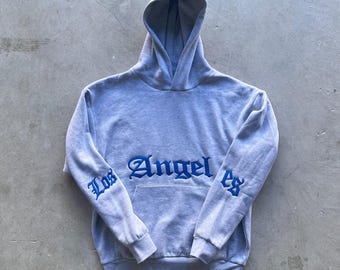 Geborduurde LOS ANGELES-hoodie. BOXY-pasvorm zonder string.