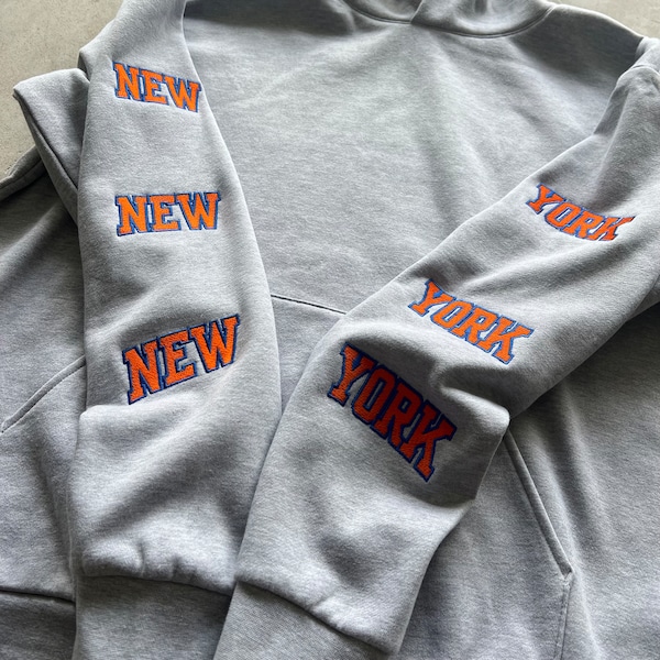 Sweat à capuche brodé NY NY . Coupe BOXY sans ficelle.