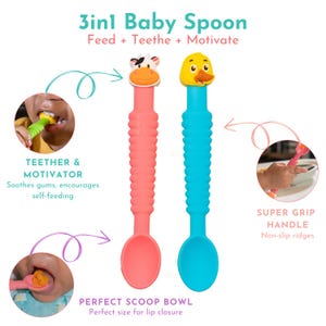 May include: Two silicone baby spoons with animal-shaped handles. The pink spoon has a cow handle and the blue spoon has a duck handle. The spoons have textured handles for easy grip and a scoop bowl designed for lip closure. The text "3in1 Baby Spoon Feed + Teethe + Motivate" is at the top of the image.