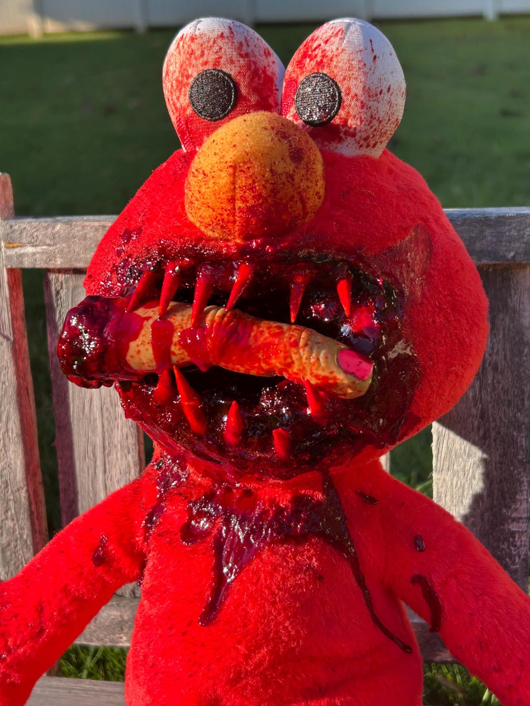 Creepy Elmo Plush Eating Finger: Horror Macabre Stuffed Animal